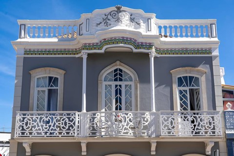 Facade of buildings in Tavira, old town, in the east of the Algarve, Portugal