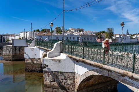 The seven-arched bridge over the Rio Gilão, in Tavira, old town, in the east of the Algarve,