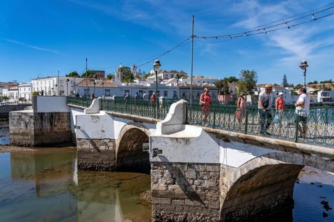 The seven-arched bridge over the Rio Gilão, in Tavira, old town, in the east of the Algarve,