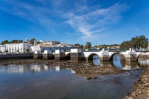 The seven-arched bridge over the Rio Gilão, in Tavira, old town, in the east of the Algarve,