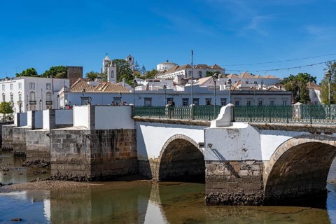 The seven-arched bridge over the Rio Gilão, in Tavira, old town, in the east of the Algarve,