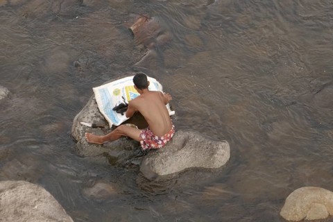 Fisherman has caught catfish, Negros Occidental, Philippines