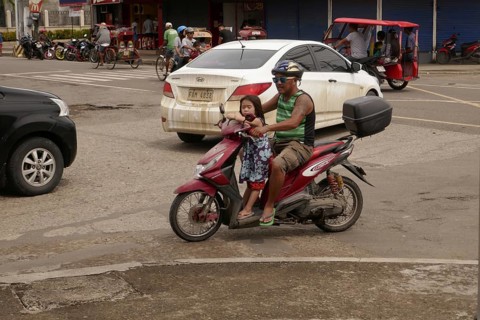 Man with moped and small daughter, Transport, Mobility, Negros Occidental, Philippines