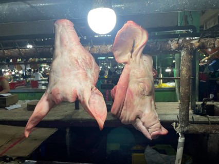 Market, market stall, pig heads, San Carlos, Negros Occidental, Philippines
