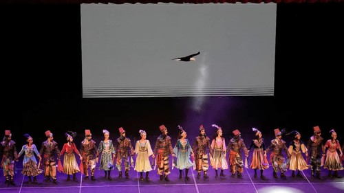 Members of Fire of Anatolia, also known as Anadolu Atesi, bow to the audience after their