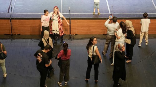 Audience members gather inside the theater before the start of the Fire of Anatolia show in