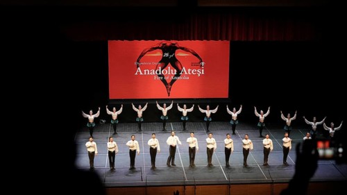 Members of Fire of Anatolia, also known as Anadolu Atesi, bow to the audience after their