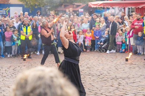 Street performance with fire breathers, surrounded by a curious crowd, Sindelfingen, Böblingen
