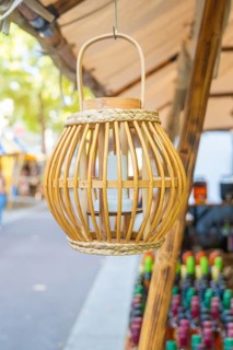 Wooden lantern hanging from a market stall with colourful bottles, Sindelfingen, Böblingen
