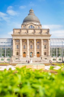 Impressive building with dome and columns, surrounded by greenery, Munich, Germany