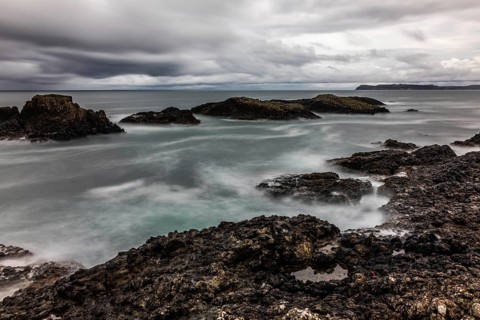Rocky coast, offshore islands, Ballintoy Harbour, Causeway Coastal Route, Antrim, Northern Ireland,