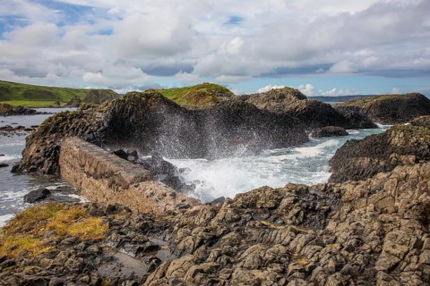 Breakwater at the fishing harbour, Ballintoy Harbour, Causeway Coastal Route, Antrim, Northern