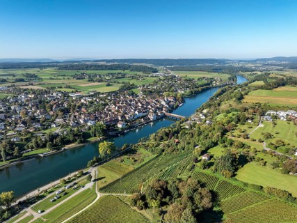 Aerial view of Diessenhofen with the historic wooden bridge over the Rhine, in the foreground a
