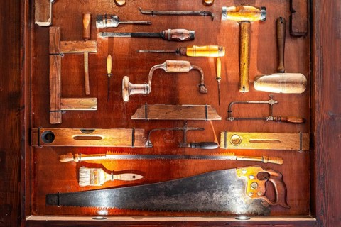 Plenty of different carpenter's tools exhibited and illuminated in the museum, Malta