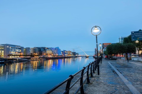View of the River Liffey and houses on the banks, blue hour, Dublin, Ireland