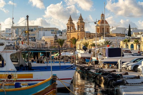 Beautiful view of Marsaxlokk, traditional maltese fisherman village on south of the island, Malta