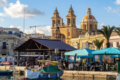 Beautiful view of Marsaxlokk, traditional maltese fisherman village on south of the island, Malta