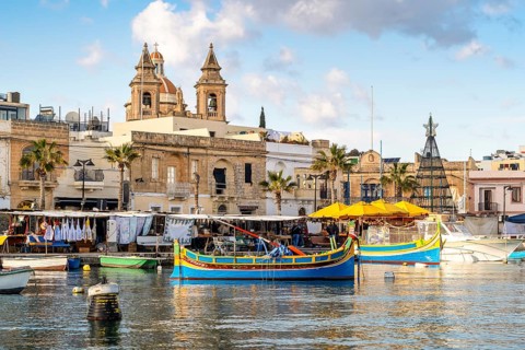 Beautiful view of Marsaxlokk, traditional maltese fisherman village on south of the island, Malta
