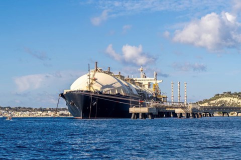 Floating Storage Unit or FSU next to power station by Marsaxlokk, south of Malta