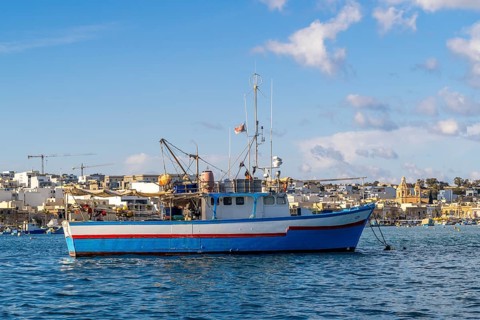 Beautiful view of Marsaxlokk, traditional maltese fisherman village on south of the island, Malta
