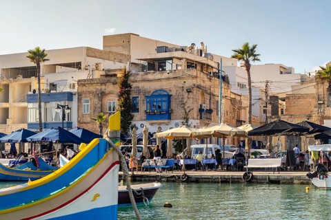 Beautiful view of Marsaxlokk, traditional maltese fisherman village on south of the island, Malta