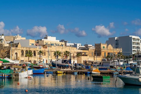Beautiful view of Marsaxlokk, traditional maltese fisherman village on south of the island, Malta