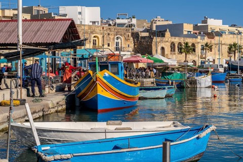 Beautiful view of Marsaxlokk, traditional maltese fisherman village on south of the island, Malta