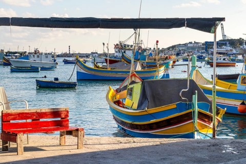 Beautiful view of Marsaxlokk, traditional maltese fisherman village on south of the island, Malta