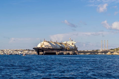 Floating Storage Unit or FSU next to power station by Marsaxlokk, south of Malta