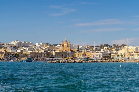 Beautiful view of Marsaxlokk, traditional maltese fisherman village on south of the island, Malta