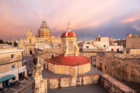 Rabat skyline with St Paul church dome on the left during sunset, Rabat Mdina, Malta