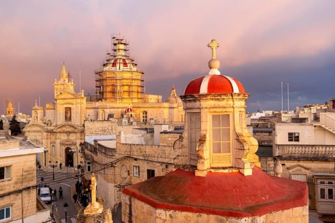 Rabat skyline with St Paul church dome on the left during sunset, Rabat Mdina, Malta