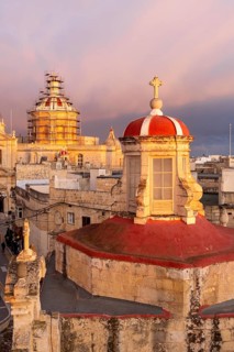 Rabat skyline with St Paul church dome on the left during sunset, Rabat Mdina, Malta