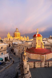 Rabat skyline with St Paul church dome on the left during sunset, Rabat Mdina, Malta