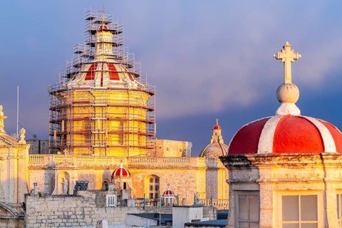 Rabat skyline with St Paul church dome on the left during sunset, Rabat Mdina, Malta