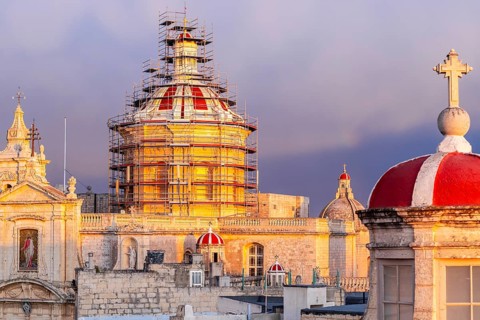Rabat skyline with St Paul church dome on the left during sunset, Rabat Mdina, Malta