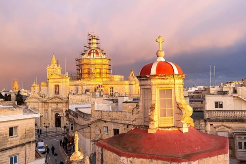 Rabat skyline with St Paul church dome on the left during sunset, Rabat Mdina, Malta