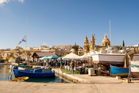 Beautiful view of Marsaxlokk, traditional maltese fisherman village on south of the island, Malta