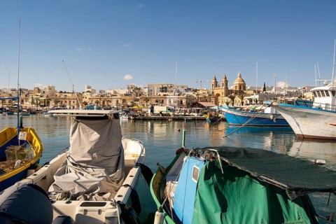 Beautiful view of Marsaxlokk, traditional maltese fisherman village on south of the island, Malta