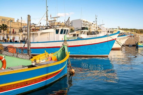 Beautiful view of Marsaxlokk, traditional maltese fisherman village on south of the island, Malta