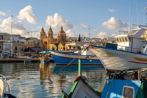 Beautiful view of Marsaxlokk, traditional maltese fisherman village on south of the island, Malta