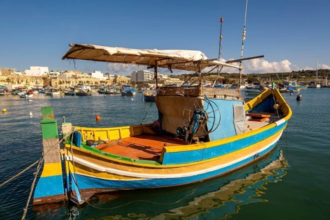 Beautiful view of Marsaxlokk, traditional maltese fisherman village on south of the island, Malta