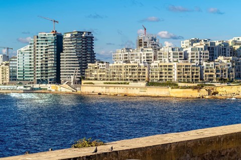 View of seafront modern part of capital city La Valletta, Malta