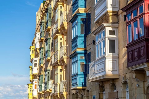 Amazing historic houses with colorful wooden balconies in La Valletta, capital city of Malta