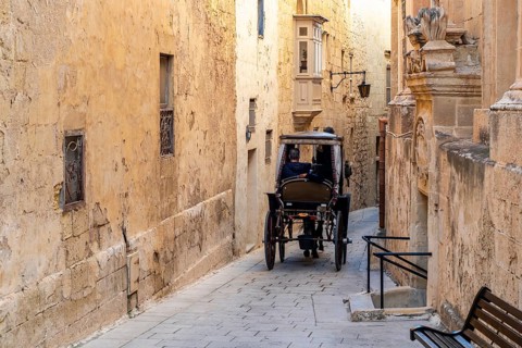 Horse carriage on historic street of L-Imdina, Rabat, Malta