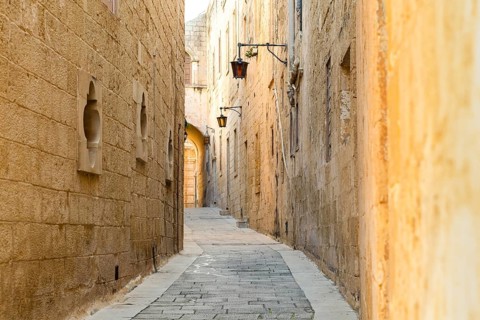Street view with lanterns in historic L-Imdina, Rabat, Malta