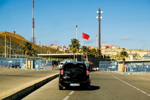Fnideq, Morocco - December 26 2023: car passing country border between Morocco and Spain