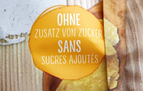 Ingredients Sugar label on a packet of cornflakes. German and French