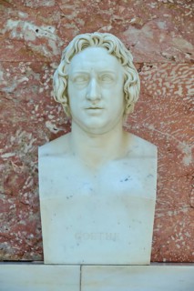 Marble bust of Johann Wolfgang Goethe against a reddish background, Walhalla, Donaustauf,