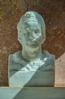 White marble bust of Jakob Fugger in front of a reddish wall, Walhalla, Donaustauf, Regensburg,